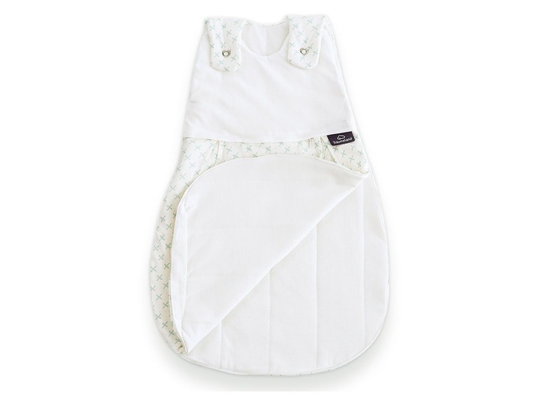 Een witte slaapzak met een gestippeld patroon van Dreamland.