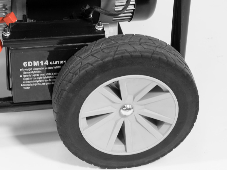 Een zwarte generator met een groot wiel.