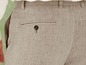 Beige linnen broek met achterzak.