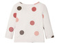 Wit T-shirt met lange mouwen met roze en bruine stippen.