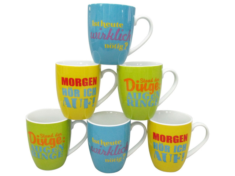 Zes mokken met grappige spreuken zoals 'Morgen hoor ik op!' en 'Stand der dingen: Oogringen'.