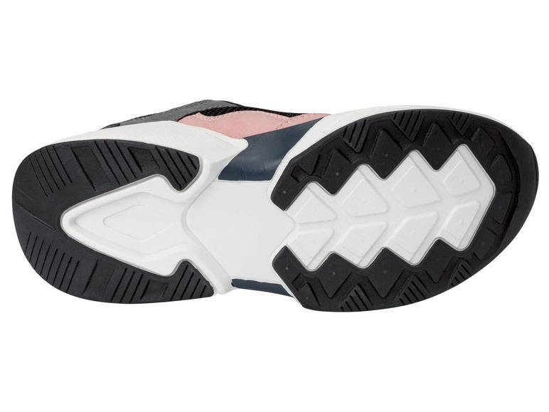 De onderkant van een zwarte en roze sneaker.