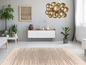 Beige vloerkleed met zigzagpatroon in een modern interieur.
