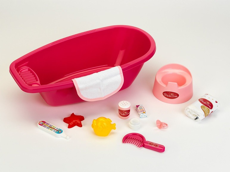 Een roze bad, potje en accessoires van Princess  Caroline voor poppen.