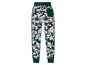 Camouflage joggingbroek met groene accenten.