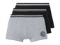 Drie boxershorts, een grijze met 'OG1' logo en twee zwarte.