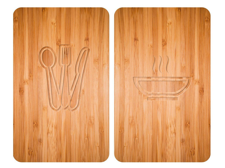 Twee houten borden met gegraveerde afbeeldingen van bestek en een kom