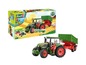 Een Revell Junior Kit model van een groene tractor met aanhanger.