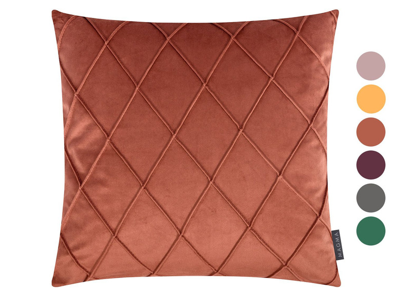 Een terracotta kussen met een ruitpatroon van Magma.