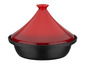Een rode tajine met een zwarte basis.