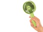 Een groene handventilator van Unold.