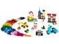 Lego-stenen, een huis, een kasteel, een scooter en een graafmachine.