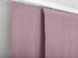 Twee roze panelen van een gordijnsysteem