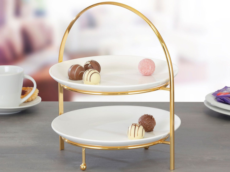 Twee-laags gouden serveerplateau met bonbons