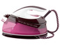 Een roze en donkerrode Philips PerfectCare Compact stoomstrijkijzer.