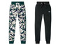 Twee joggingbroeken voor jongens: een met camouflageprint en een zwarte van Streetstyle.