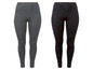 Twee paar leggings, één grijs en één zwart.