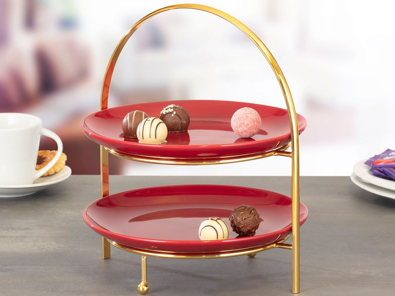 Twee-laagse serveerschaal met gouden rand, geschikt voor snoepjes en hapjes.