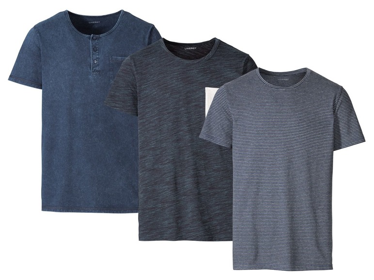 Drie blauwe T-shirts van Livergy: effen, met strepen en met een marmerpatroon.