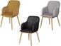 Drie moderne stoelen met bekleding in grijs, zwart en geel.