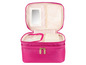 Een roze toilettas met spiegel en opbergvakken.