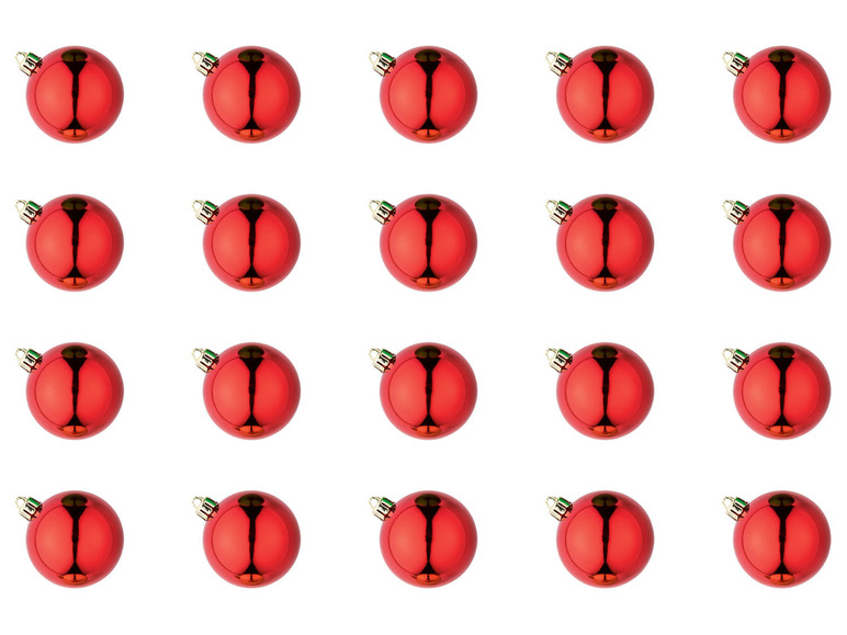 Een patroon van rode kerstballen op een witte achtergrond.