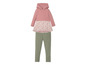 Een roze hoodie met een bloemetjes top en groene leggings.
