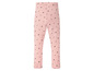 Roze leggings met hartjesprint.
