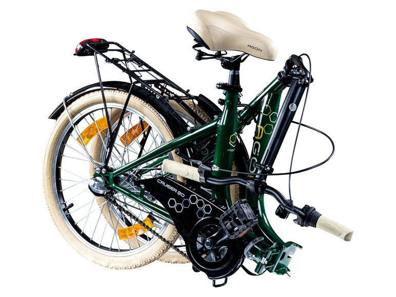 Een groene Agon Cruiser 20 vouwfiets met een bagagedrager.