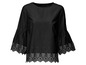 Zwart katoenen blouse met geborduurde details.