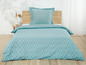 Een turquoise dekbedovertrek met een abstract patroon.