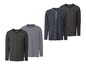 Vier lange mouwen shirts met knopen, waaronder gestreepte en effen varianten.