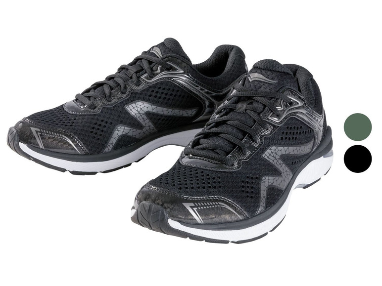 Twee zwarte hardloopschoenen met witte zolen.