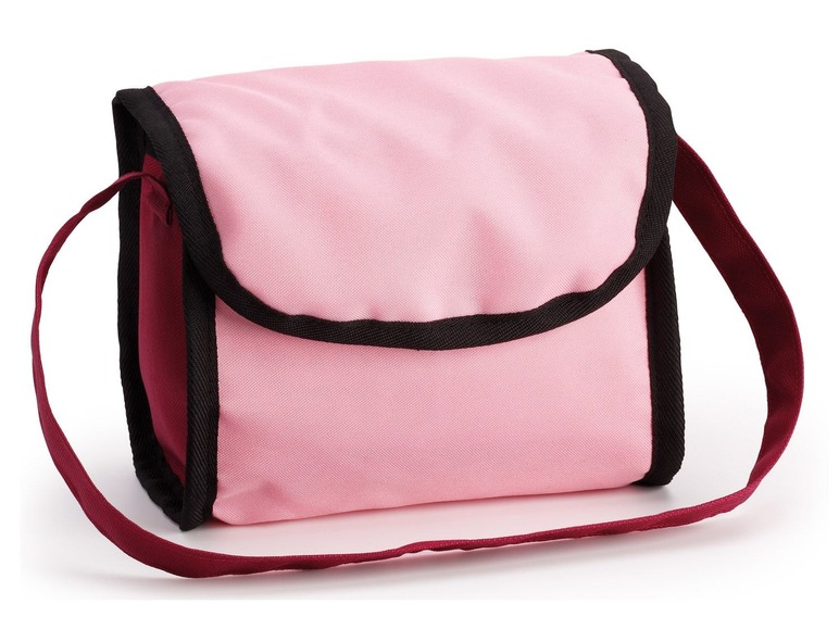 Een roze toilettas met een donkerrode schouderband.