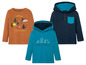 Drie longsleeved shirts voor jongens met een campingthema, waaronder een met de tekst 'offline is the new luxury'.