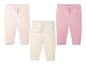 Twee paar baby leggings in roze en crèmekleur.