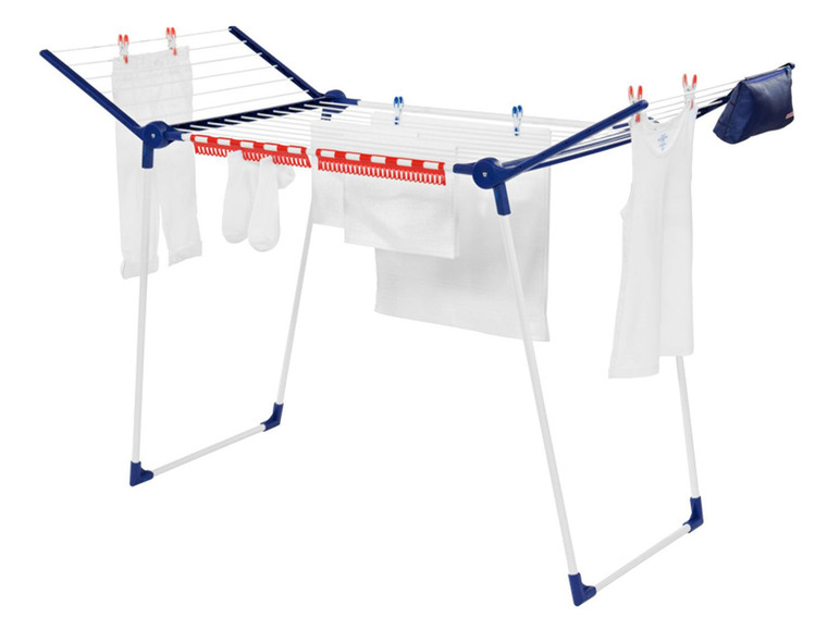 Een wit wasrek met blauwe accenten, met witte kleding en sokken.