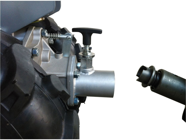 Een close-up van een trekkerkoppeling en een trekhaak.