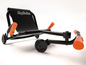 Een zwarte EzyRoller drift trike met oranje handvatten.