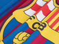 Een FC Barcelona-vlag met de kleuren blauw, rood en geel.