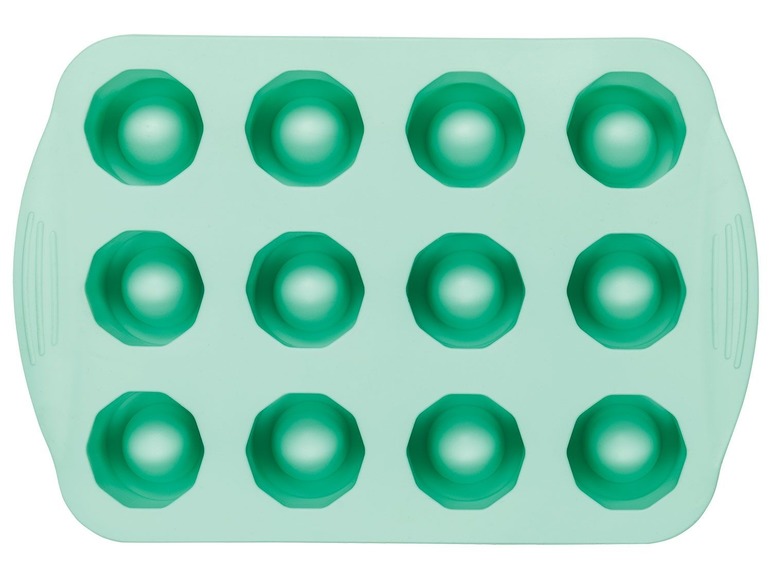 Een groene siliconen bakvorm met 12 rondingen voor het maken van cupcakes of cakepops.