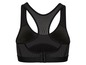 Een zwarte sportbeha met mesh-panelen voor extra ventilatie.