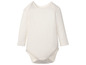 Witte baby romper met lange mouwen.