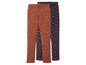 Twee leggings voor meisjes, een met stippen en een met bloemen