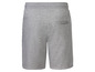 Grijze sweatshorts met elastiek en trekkoord.