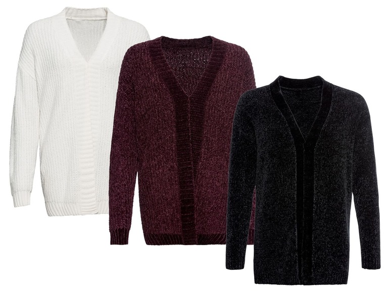 Drie gebreide truien met V-hals in wit, bordeaux en zwart.