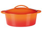 Oranje gietijzeren braadpan met deksel.