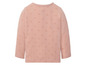 Roze longsleeve met hartjesprint voor baby's.