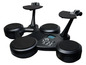Een zwarte elektronische drumset met vier pads en twee drumstokken.