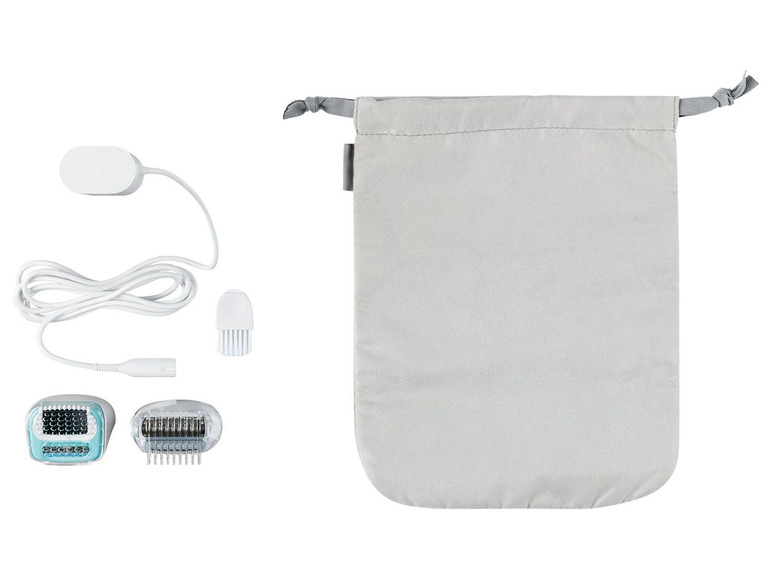 Een Braun epilator met opzetstukken, oplader en draagtas.
